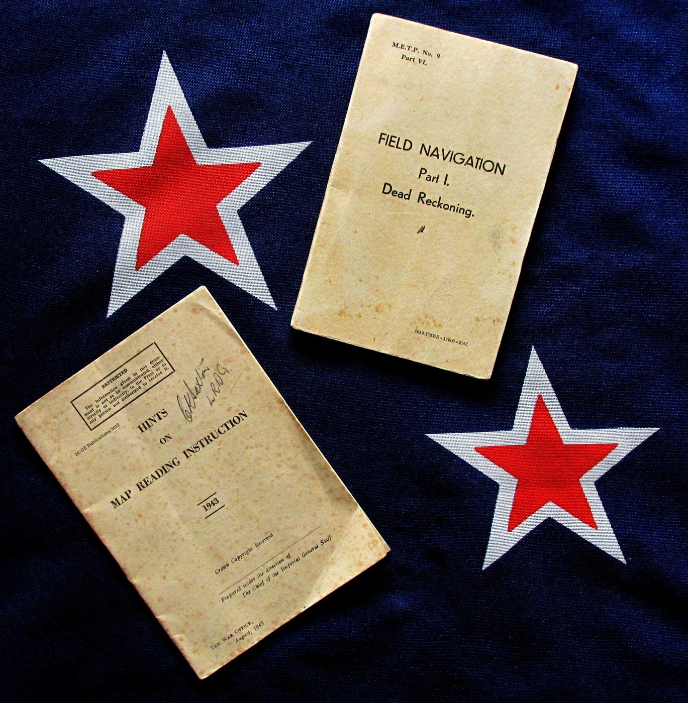 Navigation manuals: Field Navigation Part I Dead Reckoning and Hints on Map Reading Instruction, on a New Zealand ensign
