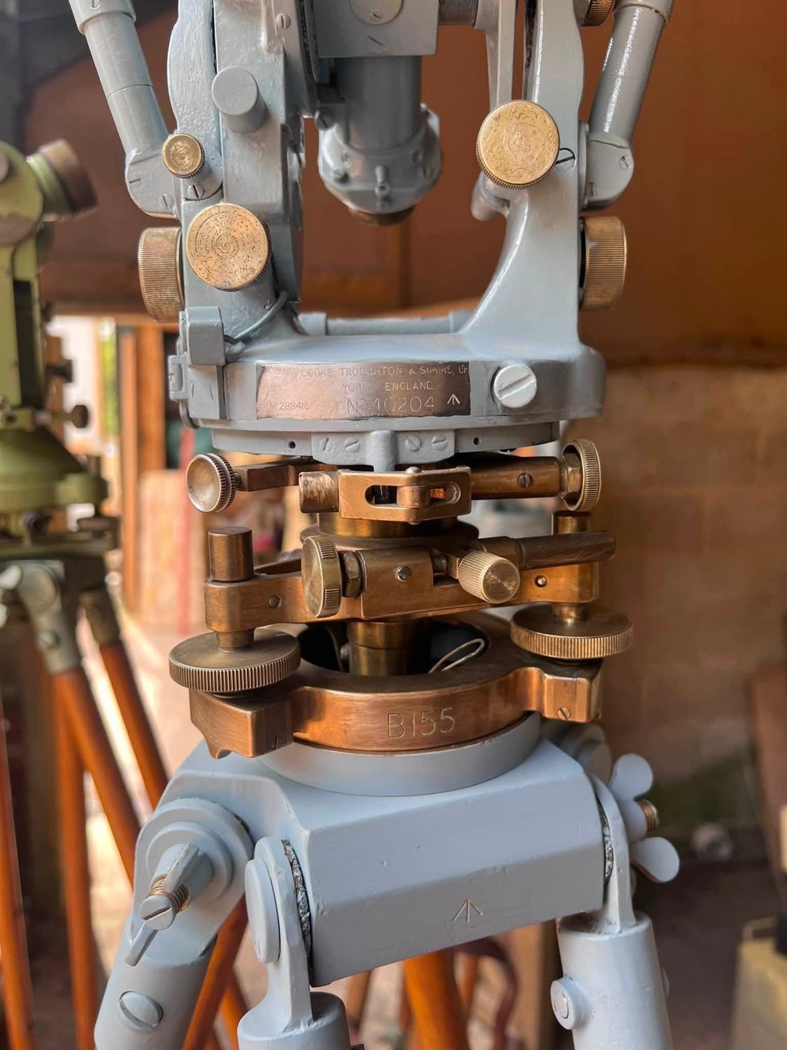 Close view of the Cooke, Troughton and Simms maker's plate and War Department broad arrow