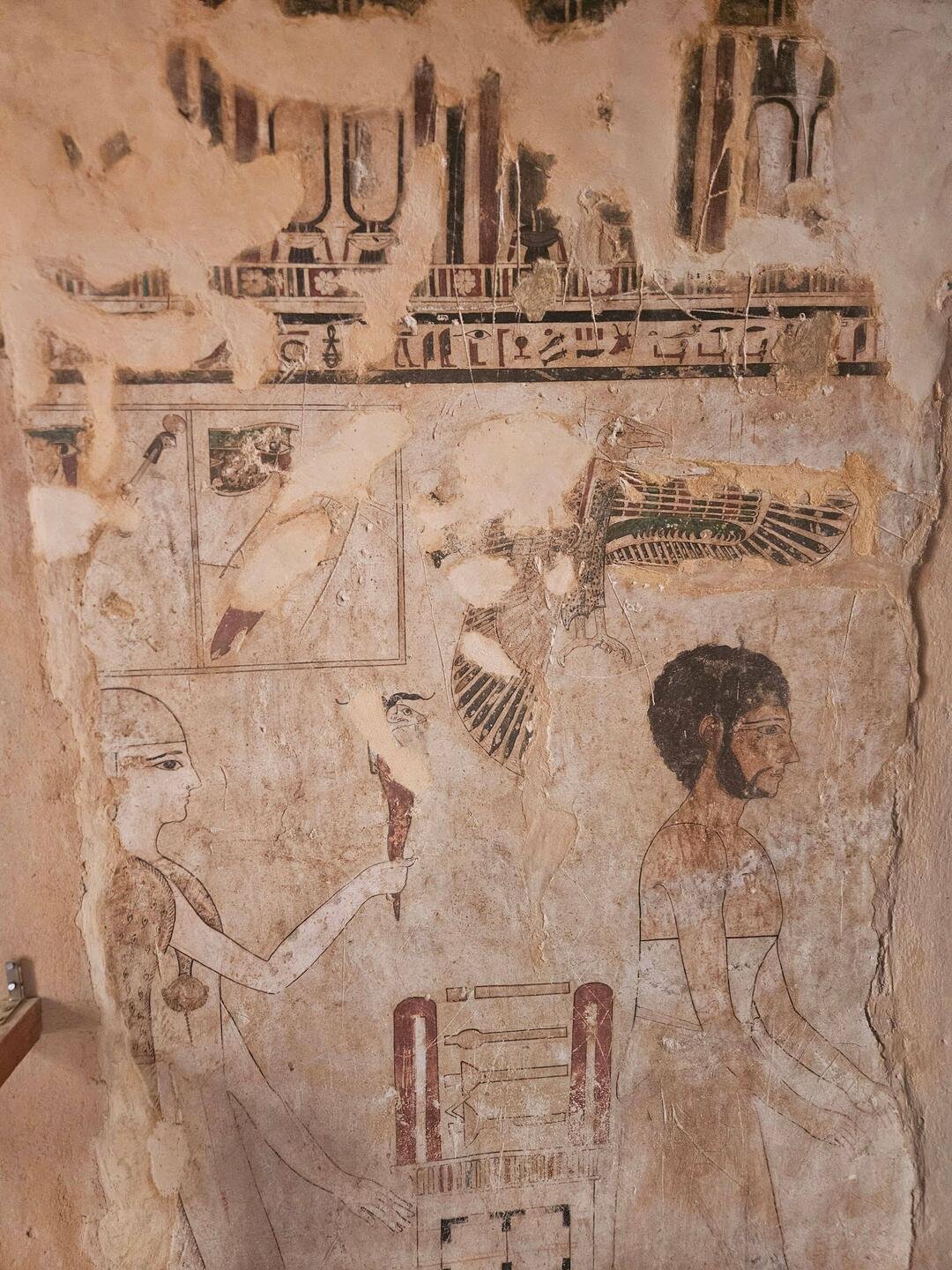Ancient wall-paintings in a rock-cut tomb, Gebel al-Mawta (the Mountain of the Dead), Siwa